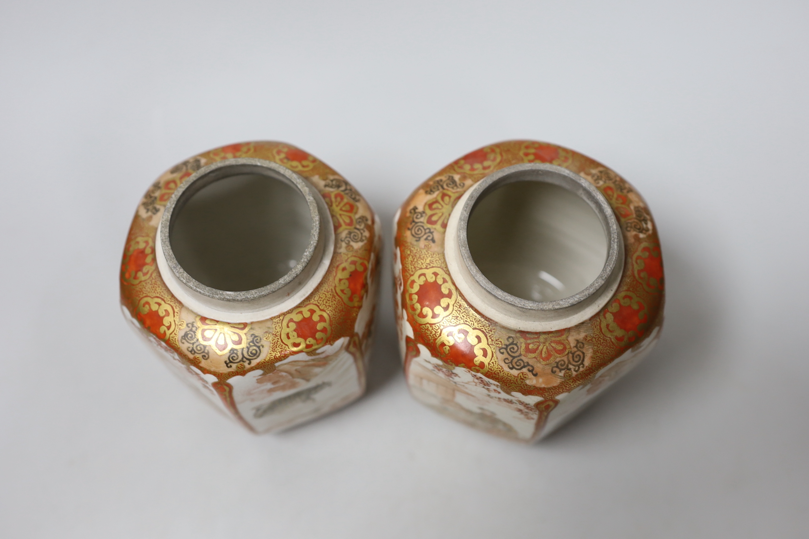 A pair of Meiji period Kutani hexagonal jars and covers, with inner and outer covers, 14cm high